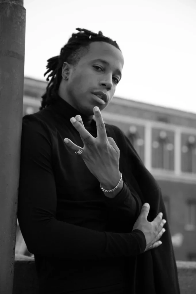 Black-and-white portrait of Chad Chambers wearing a black turtleneck