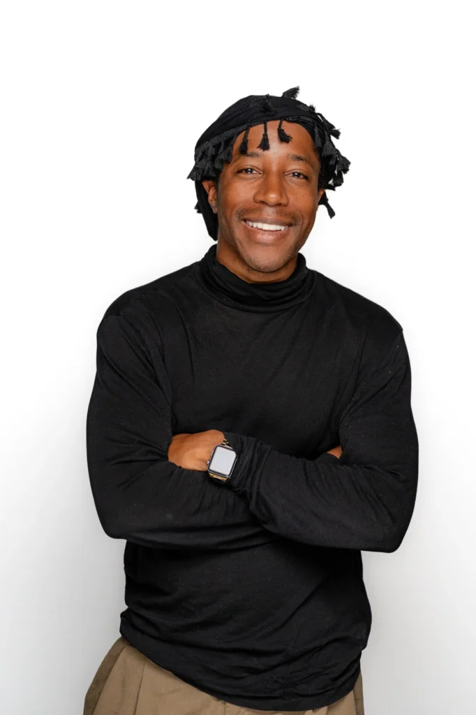 Chad Chambers smiling in a black turtleneck