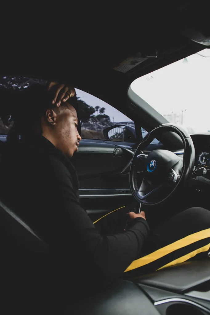 Chad Chambers seated inside a car