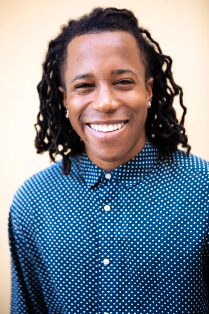 Chad Chambers smiling in an actor headshot